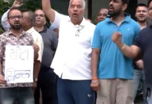 Residents of Sikka Kimaantra Greens in Noida protesting over issues related to their residential society and demanding action from the authorities.