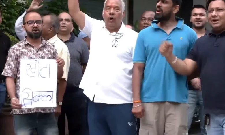 Residents of Sikka Kimaantra Greens in Noida protesting over issues related to their residential society and demanding action from the authorities.