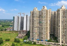 Mahagun Mantra 1 residential apartment project in Greater Noida West, featuring modern housing towers and residential amenities.